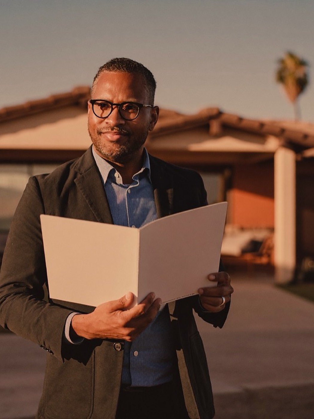 An experienced agent outside a California property